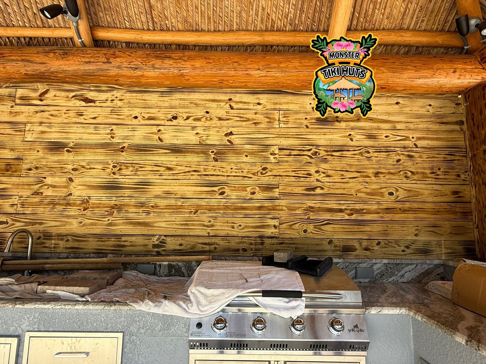 Privacy wall installation — Florida tiki hut